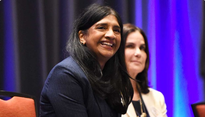 Aruna Miller, public servant and engineer, smiling during a campaign event in Maryland